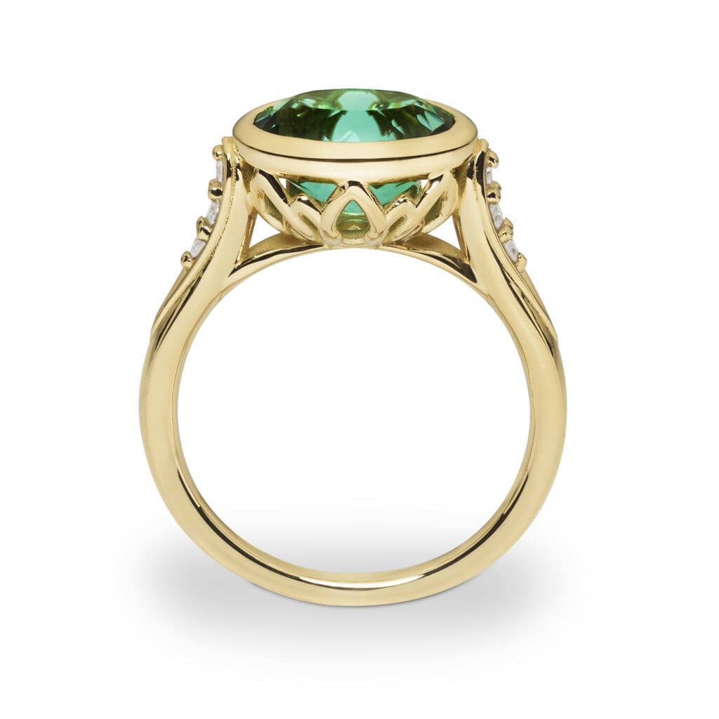 Concerto in yellow gold with a oval green tourmaline Concerto ring in yellow gold with a oval green tourmaline